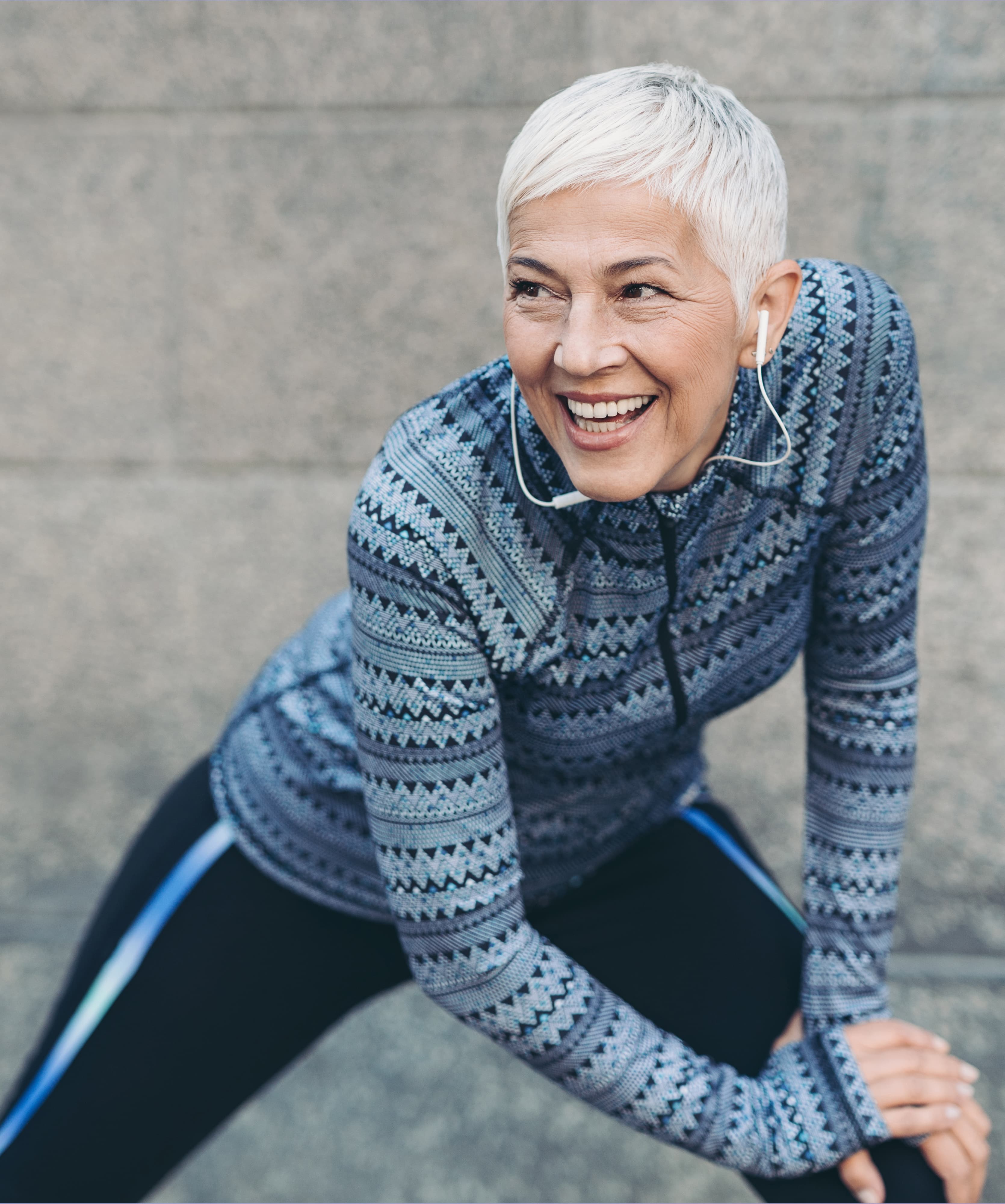 Woman stretching with headphones