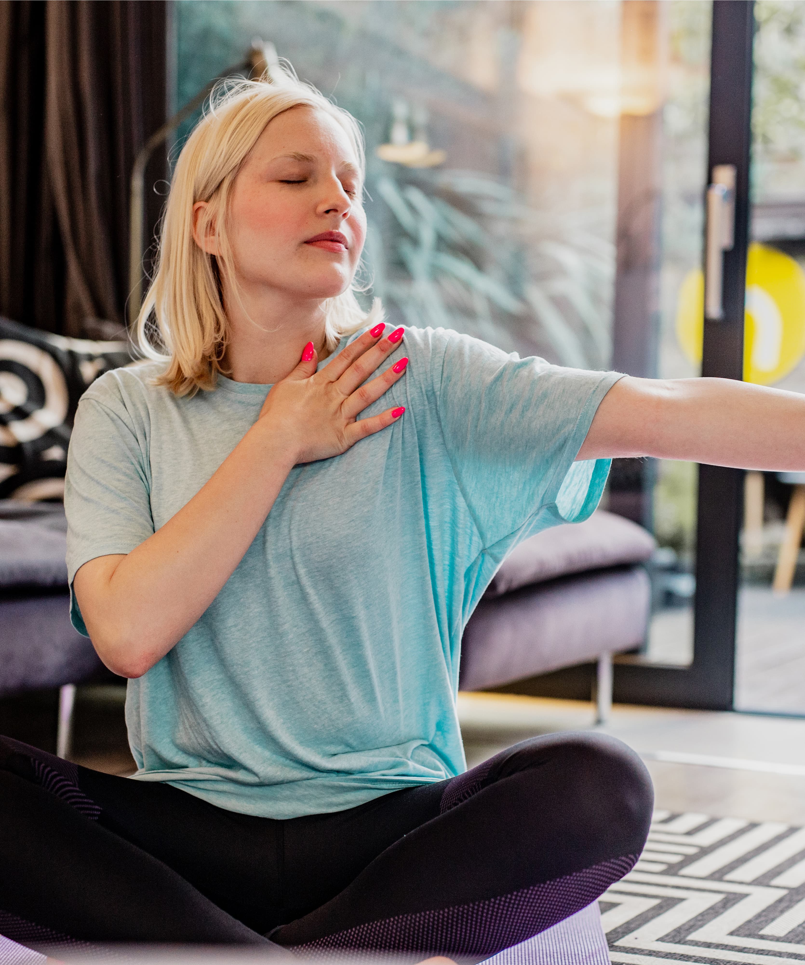 Woman practising restorative yoga